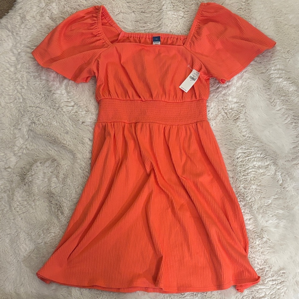 Woman’s Coral Flutter Sleeve Dress